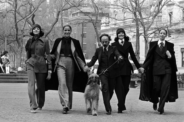Designer John Anthony walking in Central Park with four women modeling his Fall/Winter 1972 collection.